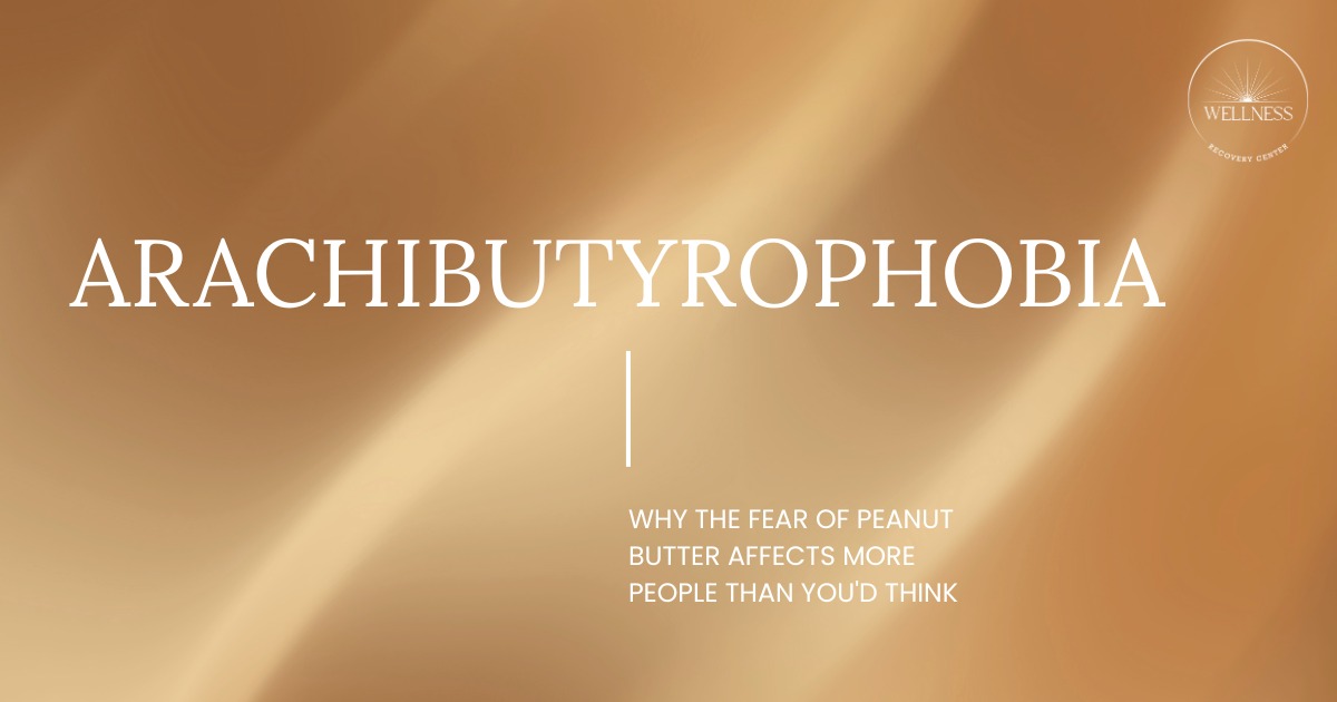 Person experiencing anxiety while looking at peanut butter on a spoon representing arachibutyrophobia fear of peanut butter sticking to the roof of the mouth